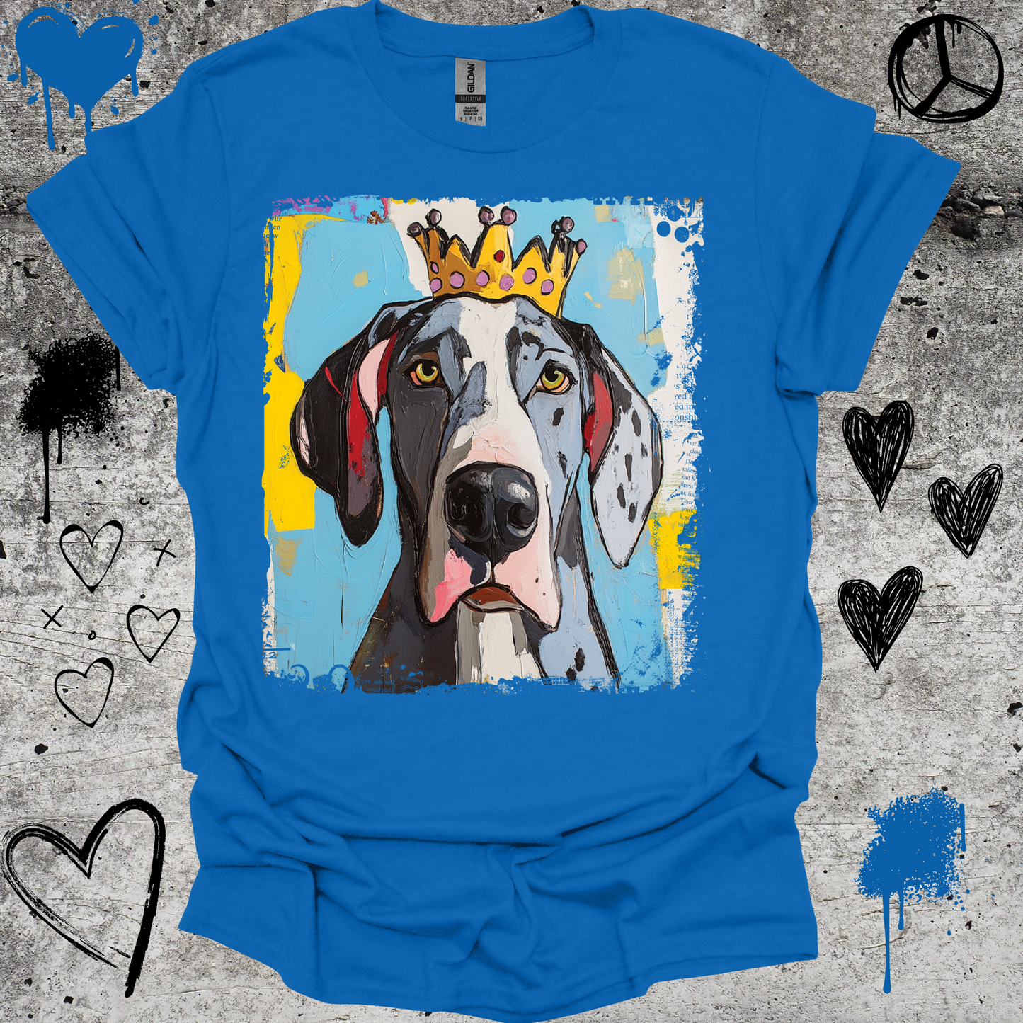 Blue t-shirt with a dog wearing a crown graphic on a textured background